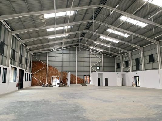 Cấu trúc thép tùy chỉnh Kho dự trữ Công nghiệp Tòa nhà kim loại chế tạo sẵn